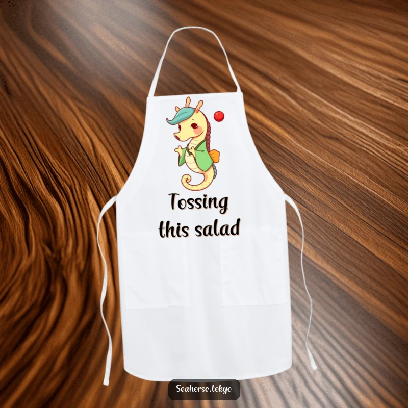Funny seahorse in a green kimono joyfully tossing a red ball, making this apron a fun and practical kitchen accessory.