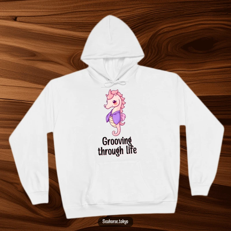 Funny Hoodie showcasing a cheerful seahorse in a purple kimono, doing a delightful happy spin, perfect for warmth.