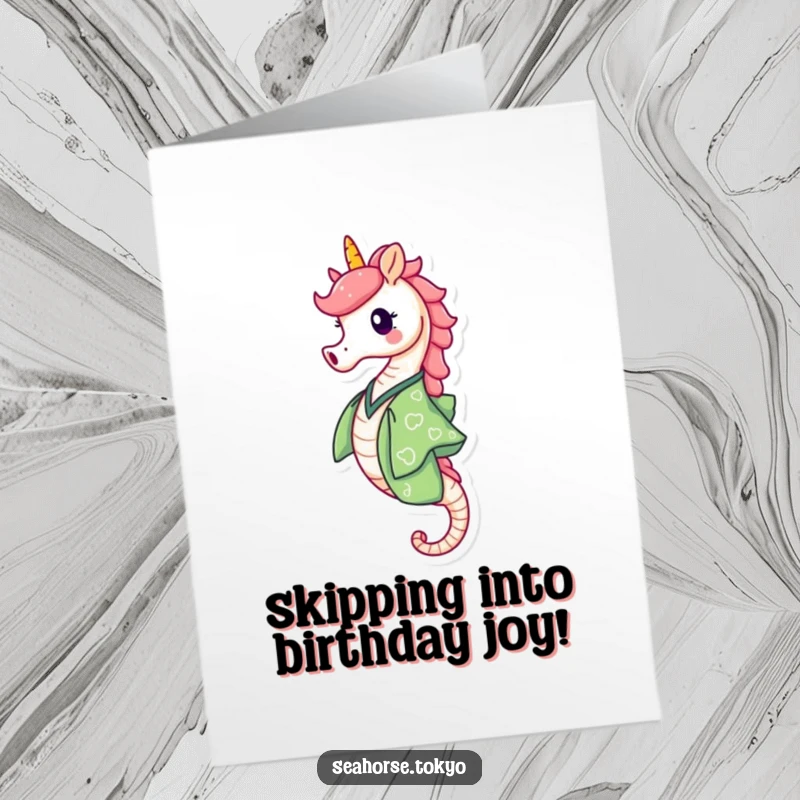 Free Printable Birthday Card: a happy seahorse in a green kimono joyfully skipping along the ocean floor.