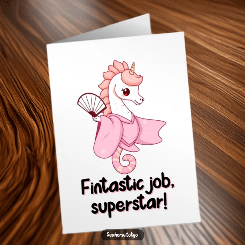 Free printable congratulations card with a cute seahorse in a pink kimono, gracefully balancing a fan, signifying elegant success.