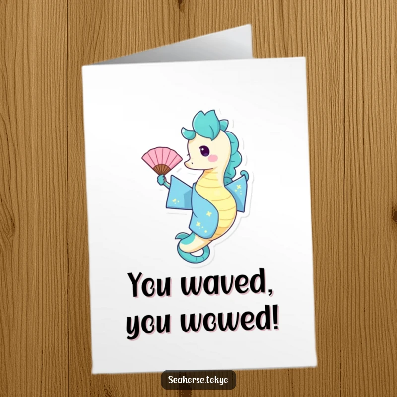 Free Printable Congratulations Card: a seahorse in a blue kimono excitedly waving a fan, conveying happiness.