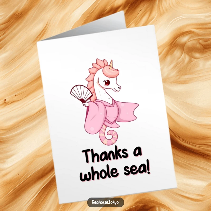 Free printable thank you card featuring a cute seahorse in a pink kimono, balancing a fan, conveying graceful thanks.