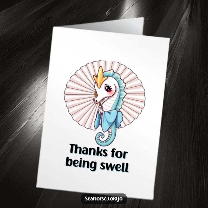 Free printable thank you card featuring a charming seahorse in a blue kimono playfully peeking from behind a fan, sending thanks.